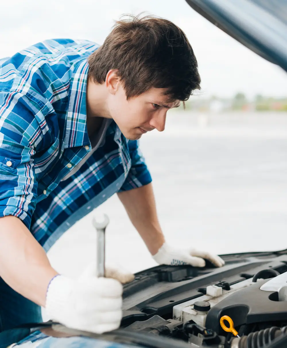 medium-shot-man-holding-wrench timing belt replacement san jose ca